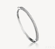 DiamondJewelryNY Eye Hook Bangle Bracelet with a Plain Disc Charm.