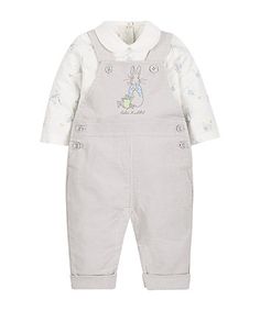 swinging boy bunny wearing overalls Swinging boy bunny wearing overalls
