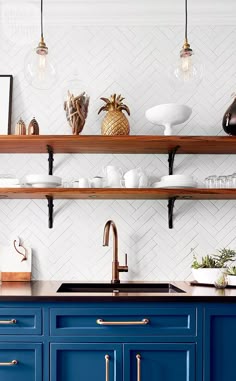 Steel Blue Cabinetry White Quartz Countertops Chevron This Parisian Bistro Inspired Kitchen In Montreal Designed By Philippe Côté Is Absolutely Chic The Vibrant Jewel Toned Blue Cabinetry Wi