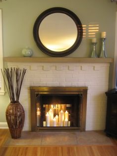 So many great ideas for non working fireplace! Candles on top of birch logs- Just lovely! | ? DIY So many great ideas for non working fireplace! Candles on top of birch logs- Just lovely!