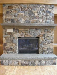 Refaced fireplace with manufactured stone veneer... LOVE this! I was just thinking about doing this to the fire place in the dining room! Refaced fireplace with manufactured stone veneer... LOVE this! I was just thinking about doing this to the fire place in the dining room!