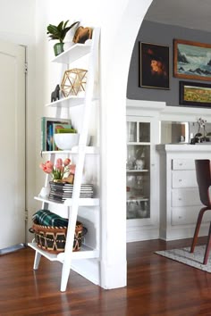 oleander and palm leaning bookcase