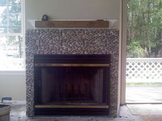 79 Best Fireplaces Pebble And Stone Tile Images Fire Places Tile Fireplaces Fireplace Designed With Stacked River Rock