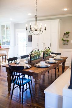 chic cottage dining room features a farmhouse dining table lined chic cottage dining room features a farmhouse dining table lined