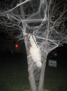 newspaper cheese cloth fishing line artificial webbing giant spider halloween