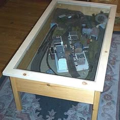 MINIATURE ELECTRIC TRAIN SET INSIDE COFFEE TABLE, ENGLAND | GLOBAL ... MINIATURE ELECTRIC TRAIN SET INSIDE COFFEE TABLE, ENGLAND | GLOBAL ...