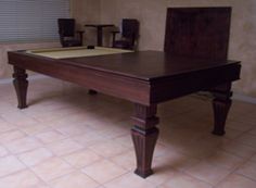 dining room table converts to pool table and tv is behind mirror dining room table converts to pool table and tv is behind mirror