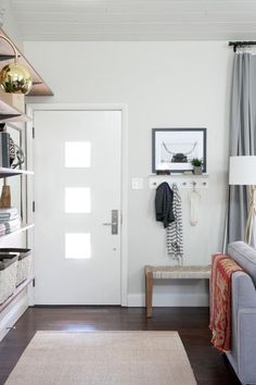 How-To Decorate When Your Front Door Opens Into Your Living Room ... How-To Decorate When Your Front Door Opens Into Your Living Room ...