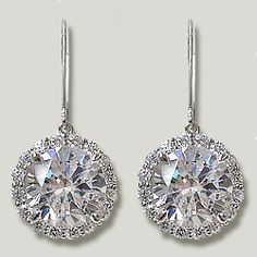 Skye Halo Oval Drop Cz Earrings Roximately 5 0 Carats Total Our Ella Drop Earrings Feature A Eurowire Leverback Top And Gorgeous Round With Halo Of Cubic Zirconia Rounds Available In White Gold