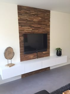 Prachtig idee voor een unieke wanddecoratie. Deze houten wandbekleding geeft uw woning een bijzondere belevenis. Living Room Tv Unit Designs