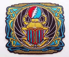 GRATEFUL DEAD EMBROIDERED PATCH GOLD METALLIC THREAD LOGO 5/" X 2/"