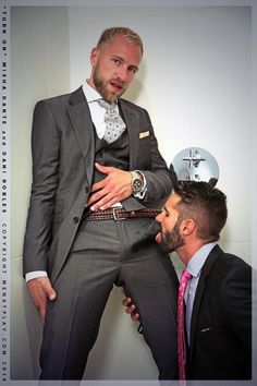 Men having sex in suits