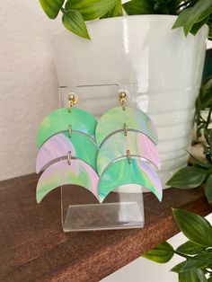 round danging earrings in polymer clay and tropical leaf motifs Fimo blue grey jungle spirit