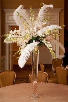 14 Best Ostrich Feather Arrangements Images I Want To Design This For Someone How Fun Centerpiece Featuring Dendrobium Orchids And Ostrich Feather Centerpiecesflower