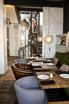 industrial look wood and concrete for giraffe restaurant tel aviv