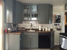 My Sarasota Kitchen Cabinets Kraftmaid Pebble Grey With Shaded Cambria Whitney Counters Kraftmaid Pebble Grey Cabinet Stainless Gl Backsplash