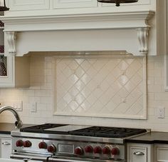cream subway tile backsplash | the fireplace surround is done in 2 cream subway tile backsplash | the fireplace surround is done in 2