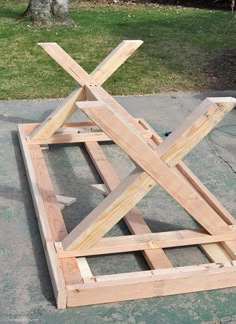 Beautiful Wooden Table Favorite Places Es Pinterest Build This Diy Outdoor Table Featuring A Herringbone Top And X Brace Legs Would Also