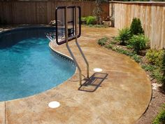 acid stained concrete and stone border around pool | h<3me acid stained concrete and stone border around pool | h<3me
