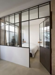 Loft in Paris by Maxime Jansens (15) bedroom with glass wall and large door Bedroom, Loft Wall, Interior Wall Design, Glass Partition Wall, Walls Room, Divider Wall