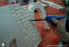 make scale model stone walls from recycled styrofoam and christmas miniture villages
