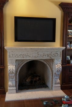 Cantera fireplace | Fireplaces | Pinterest | Wrought iron Fire places and Mantels