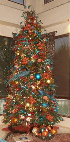 bronze poinsettias wturquoise ill add deer horns and peacock feathers orange christmas - Orange Christmas Tree Decorations bronze poinsettias wturquoise ill add deer horns and peacock feathers orange christmas - Orange Christmas Tree Decorations