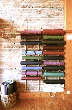 Yoga Mat Storage With Pvc Perhaps Vertical Around Perimeter Of Room Yoga Room Minimalist Design Where Accessories Are Embraced As Part Of The Decor And Celebrated Storage Idea For New Studio You Could Do It With Foam