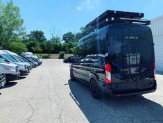 Congrats to Nathan on his custom LIV rig with #VanDOit roof rack, ARB awning, #Roofnest, solar power, battery bank,# rear ladder, #BFGoodrichTires, #ultratoil rims, #Dometic AC & fridge, #MaxxAirvent, custom leather interior, kitchen pod, swivel passenger seat, hydraulic bed lift with folding leaf, gear slide, water system, shower stall kit, ceiling cargo rails, hanging cabinets & thermal window curtains! Welcome to the #VDIfam! 🚐 #vanlife #campervan #adventurevan #conversionvan #FordTransit Shower Stall Kits, Ford Transit Camper, Rv Financing, Thermal Windows, Used Vans, Roof Top Tent, Water Systems, Roof Rack, Custom Leather