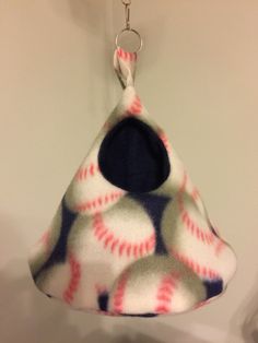 A Sugar glider egg shaped cage pouch with petals