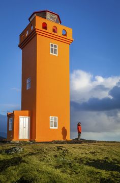 Here to brighten things is Svörtuloft Lighthouse - in fact, quite a few of the lighthouses in this part of Iceland are cheerfully painted, a popular choice being the same vibrant orange as Svörtuloft. Rising from the cliff edge, the views from this beautiful coastal spot will take your breath away (if the freezing winter temperatures don’t manage to). The pounding sea surrounding the peninsula makes a deafening noise as it crashes against the rocky walls, creating a very dramatic atmosphere. Водонапорная Башня, Красивые Места, Вокруг Света, Суперсемейка, Яхты, Удивительная Природа, На Свежем Воздухе, Макет, Органайзер