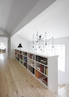 A DIY Bookcase Stair Railing - love this use of space for more ... A DIY Bookcase Stair Railing - love this use of space for more ...