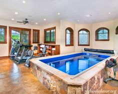 fabulous indoor lap pool is a great addition to the home gym