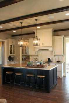 I Love This Kitchen Green Walls White Cabinets Black Love Everything About This Kitchen The White Cabinets Black Island Light Fixtures Ceiling Beams And Countertops