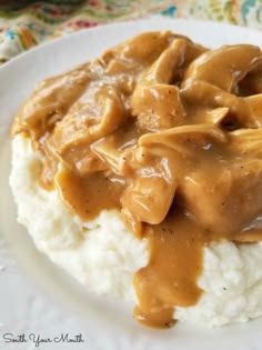 Crock Pot Chicken & Gravy | An easy and delicious slow cooker recipe for tender chicken with savory gravy perfect served over mashed potatoes, noodles or rice.