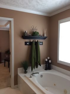 20 Wall Decorating Ideas For Your Bathroom Design Master Bath Decor Towel Hooks And Shelves