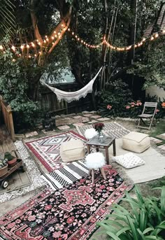 Moroccan party decor bohemian backyard party hammock outdoor rugs poufs Bohemian Backyard Party, Bohemian Patio, Bohemian Garden Ideas, Bohemian Rug, Modern Bohemian, Moroccan Garden Ideas, Hippie Backyard, Bohemian Outdoor Spaces, Bohemian Grove