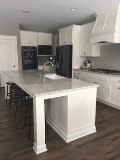 single kitchen cabinet cupboard this white kitchen is classic yet modern and features crisp cabinetry an oversized black stainless kitchenaid appliances cabinets craftsman single kitchen cabinet cupboard this white kitchen is classic yet modern and features crisp cabinetry an oversized black stainless kitchenaid appliances cabinets craftsman