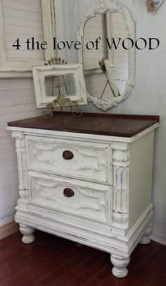 i m leaning toward white furniture with dark handles leaving dark
