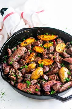 Skillet Garlic Butter Steak and Potatoes - Quick and easy pan seared meal with juicy steak bites and crispy fingerling potatoes coated in a delectable garlic butter herb sauce (gluten free). From aberdeenskitchen.com. #skillet #garlic #butter #herb #steak #potatoes #glutenfree #dinner #recipe #quick #easy #onepot