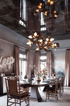 Ooh la la - the reflection in the ceiling! 😍 We are in awe of this 10 foot Gingko Chandelier by @rosielistudio for a glammed out dining space by @wesleymooninc    #remainslighting #rosieliestudio #rosieliforremains #gingkochandelier Home Office Design On A Budget, Mirror Ceiling, Transitional Dining Room, Top Interior Designers, Dining Room Design, Dining Rooms, Ceiling Design, 1stdibs