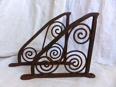 A pair of solid cast iron exotic bird shelf brackets wall shelving bracket EX1