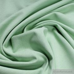 Fabric cotton polyester elastane single jersey pastel turquoise mottled roughened winter-sweat