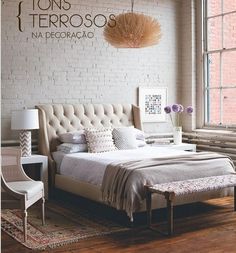 Master Bedroom White Brick Wall As Accent Ivory Tufted Headboard And Rust Coloured Persian Rug Side Tables Brass Glass West Elm