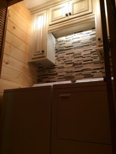 before and after log cabin small laundry room upgrade antique white