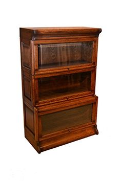 Een teakhouten Globe Wernicke-stijl boekenkast met glazen deurtjes ... Een teakhouten Globe Wernicke-stijl boekenkast met glazen deurtjes ...