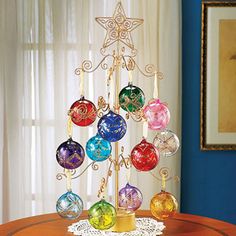 24 Gold Metal Tree Spinning Ornament Display 24 Gold Metal Tree Spinning Ornament Display