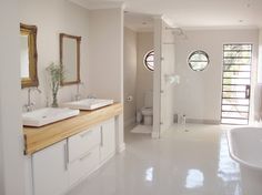 83 Best Bathroom Floors Images On Pinterest In 2018 Bright White Polished Porcelain Floors With A Pop Of Timber