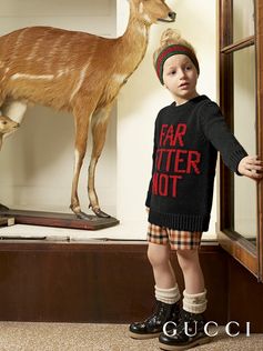 Part of the Gucci Fall Winter 2018 Children's Collection, a wool sweater featuring "Far Better Not" jacquard on the front, a motto inspired by the 11th Duke of Devonshire.