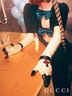 At the kaleidoscopic party imagined by Petra Collins for Gucci Gift 2018, new Gucci Jewelry pieces including a leather strap bracelet featuring a lion head with a multicolor enamel pendant.